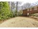 Large backyard with an extension of grass, providing ample space for recreation at 18 Brandon Ridge Dr, Sandy Springs, GA 30328