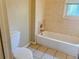 Simple bathroom with a shower-tub combo and ceramic tile at 2736 Claire Ter, Decatur, GA 30032