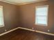 Bedroom with hardwood floors and a large window at 2736 Claire Ter, Decatur, GA 30032