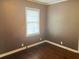 Bedroom with hardwood floors, window, and painted walls at 2736 Claire Ter, Decatur, GA 30032