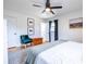 Relaxing bedroom with wood floors, a ceiling fan, natural light, and a stylish teal chair at 3020 Norton Se Ct, Smyrna, GA 30082