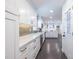 Modern kitchen featuring white cabinets, quartz countertops, and stainless steel appliances at 3020 Norton Se Ct, Smyrna, GA 30082