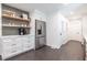 Cozy kitchen with open shelving, modern coffee station, and stainless steel appliances at 3020 Norton Se Ct, Smyrna, GA 30082