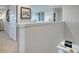 Hallway space with an area featuring a sink, cooktop, and natural lighting at 509 Vervain Drive, Locust Grove, GA 30248