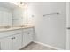 Bright bathroom with double vanity, modern fixtures and stone countertops offering space and elegance at 674 Sundial Ln, Mableton, GA 30126