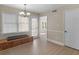 Cozy dining area with built-in bench seating, light fixture, and natural light at 105 Lakeview Ln, Stockbridge, GA 30281