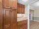 Wood cabinets and granite countertops add style to this kitchen at 105 Lakeview Ln, Stockbridge, GA 30281