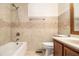 Bathroom featuring tiled shower and vanity at 5293 Oakridge Dr, Stone Mountain, GA 30083