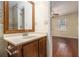 Bathroom with tiled shower and vanity at 5293 Oakridge Dr, Stone Mountain, GA 30083