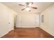 Bedroom with hardwood floors, a ceiling fan, and natural light at 5293 Oakridge Dr, Stone Mountain, GA 30083