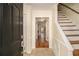 Inviting foyer with hardwood floors and a staircase to the upper level at 5293 Oakridge Dr, Stone Mountain, GA 30083