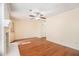 Bright living room with hardwood floors, neutral paint, and a ceiling fan at 5293 Oakridge Dr, Stone Mountain, GA 30083