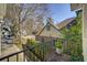 Outdoor balcony offering views of a tree-lined street and neighboring homes at 231 Peachtree Ne Way, Atlanta, GA 30305