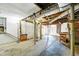 Unfinished basement with exposed ductwork and concrete floor at 231 Peachtree Ne Way, Atlanta, GA 30305