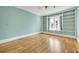 Tranquil bedroom featuring built-in bookshelves and a cozy window nook, creating a peaceful retreat at 231 Peachtree Ne Way, Atlanta, GA 30305