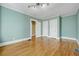 Spacious living room featuring light fixtures, and access to the home's hallway at 231 Peachtree Ne Way, Atlanta, GA 30305