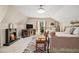 Cozy bedroom featuring fireplace, comfortable bed and stylish furnishings at 487 Glendale Ct, Stone Mountain, GA 30087
