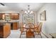 Breakfast nook area featuring a wooden table with chairs and a large window at 487 Glendale Ct, Stone Mountain, GA 30087