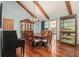 Elegant dining room featuring hardwood floors, a chandelier, and a china cabinet at 487 Glendale Ct, Stone Mountain, GA 30087