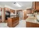 Well-lit kitchen featuring stainless steel appliances and a central island with a granite countertop at 487 Glendale Ct, Stone Mountain, GA 30087