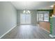 A bright dining room with sliding glass doors and stylish light fixture at 32 Hampton Dr, Cartersville, GA 30121