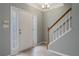 Bright foyer featuring new floors, white trim and natural light with a staircase at 32 Hampton Dr, Cartersville, GA 30121