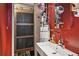 Stylized bathroom with custom mirror and a unique textured sliding barn door at 694 Argonne Ne Ave # 4, Atlanta, GA 30308