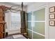 Cozy bedroom featuring a modern closet with sliding doors and organized shelving at 694 Argonne Ne Ave # 4, Atlanta, GA 30308
