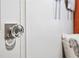 Elegant crystal door knob with stainless steel hardware and neutral wall paint at 694 Argonne Ne Ave # 4, Atlanta, GA 30308
