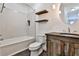 Bathroom featuring a shower/tub combo and a rustic vanity with a vessel sink at 301 Masons Creek Cir, Atlanta, GA 30350