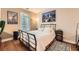 Comfortable bedroom featuring a cozy bed, a stylish nightstand, and soft, natural lighting at 397 4Th Ne St, Atlanta, GA 30308