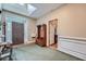Inviting foyer with a wooden hall tree, skylight, and decorative rug offers a warm welcome at 397 4Th Ne St, Atlanta, GA 30308