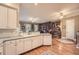 Open kitchen flows into the dining and library area with lots of natural light at 397 4Th Ne St, Atlanta, GA 30308