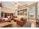 Comfortable living room with hardwood floors and built-in bookcases at 397 4Th Ne St, Atlanta, GA 30308