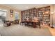 Elegant room with a full wall bookcase and seating area at 397 4Th Ne St, Atlanta, GA 30308