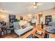 Cozy living room with a comfortable sofa, hardwood floors, and a ceiling fan at 397 4Th Ne St, Atlanta, GA 30308