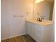 Contemporary bathroom with white vanity and modern fixtures at 554 Samaritan Dr, Cumming, GA 30040