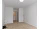 An airy bedroom featuring neutral carpeting and freshly painted white walls at 554 Samaritan Dr, Cumming, GA 30040