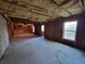 Spacious unfinished basement with natural light, framing, and customization potential at 7402 Gossamer St, Union City, GA 30291