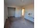 Bedroom featuring closet and door leading to the hallway at 7402 Gossamer St, Union City, GA 30291