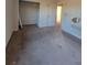 Bedroom featuring closet and door leading to the hallway at 7402 Gossamer St, Union City, GA 30291