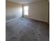Sunlit bedroom providing a blank canvas, ready for you to customize to your preferences at 7402 Gossamer St, Union City, GA 30291
