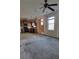 Open kitchen with wood cabinets and tile backsplash at 7402 Gossamer St, Union City, GA 30291
