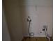 Laundry room with basic hookups and shelving, ready to accommodate modern appliances at 7402 Gossamer St, Union City, GA 30291