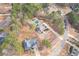 Overhead shot of property with pool, patio, gazebo, and trees at 320 Red Fox Dr, Canton, GA 30114