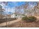 Exterior view of a house and backyard at 320 Red Fox Dr, Canton, GA 30114