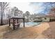 The backyard features an inground pool with cover, outdoor gazebo, and manicured landscaping at 320 Red Fox Dr, Canton, GA 30114