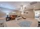 Basement with a comfortable seating area, a fireplace, and neutral colored carpet at 320 Red Fox Dr, Canton, GA 30114