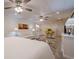 A finished basement with a seating area, a bed, and a convenient kitchenette at 320 Red Fox Dr, Canton, GA 30114