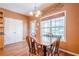 Cozy breakfast nook with natural light, features a wood table and chairs set at 320 Red Fox Dr, Canton, GA 30114